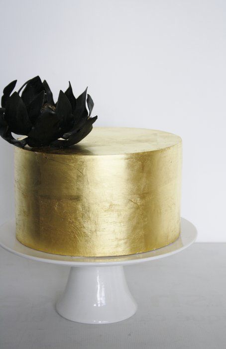 An edible gold bar cake - Decorated Cake by vedha - CakesDecor